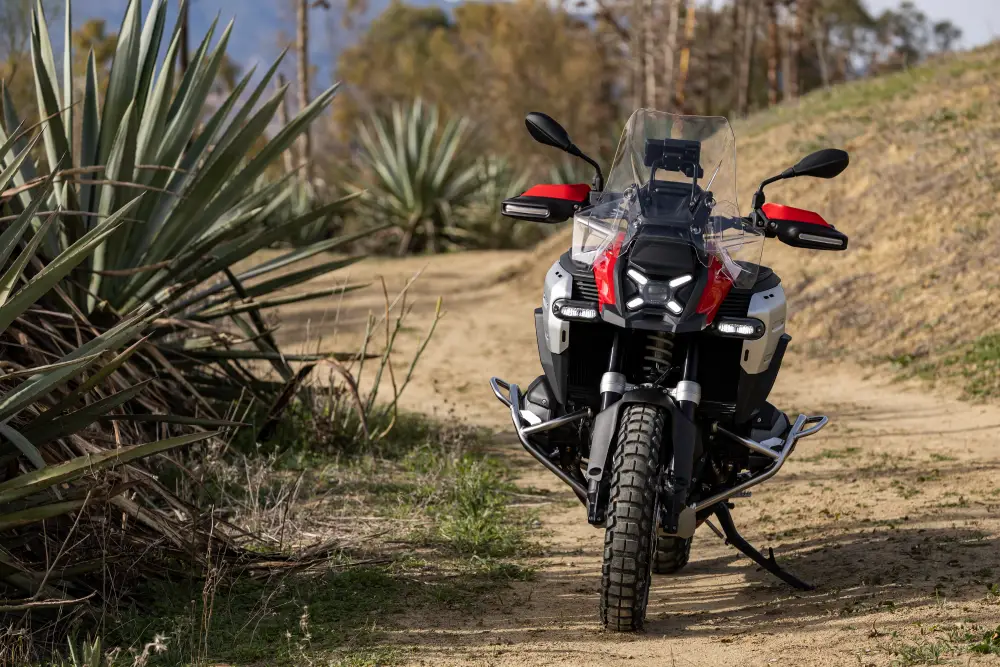 Red 2025 BMW R 1300 GS being parked in Alhambra, CA